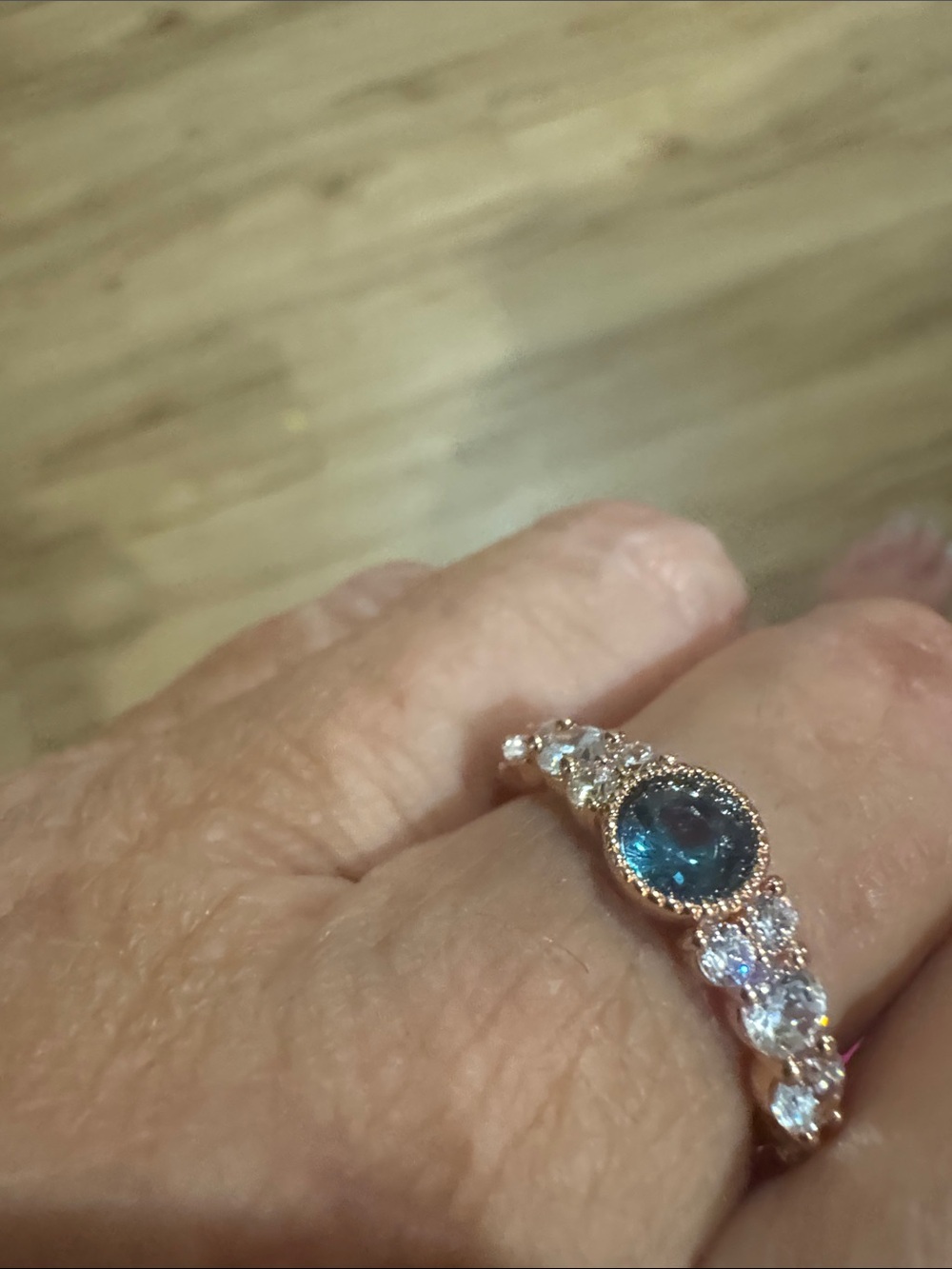 Blue Gemstone Halo Ring in Gold-Tone